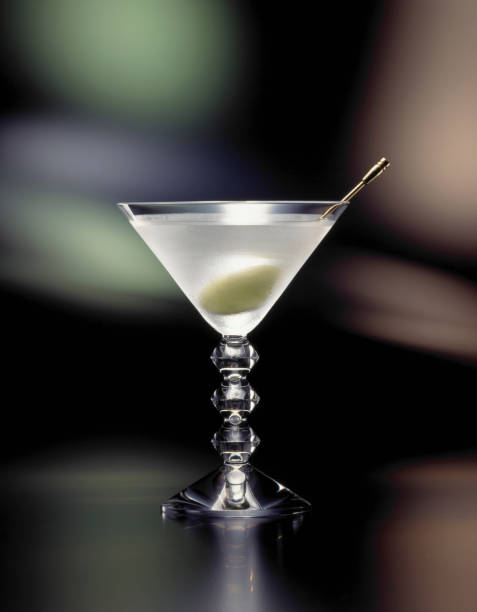 istock Poured into a cocktail glass Martini with olives 845199588