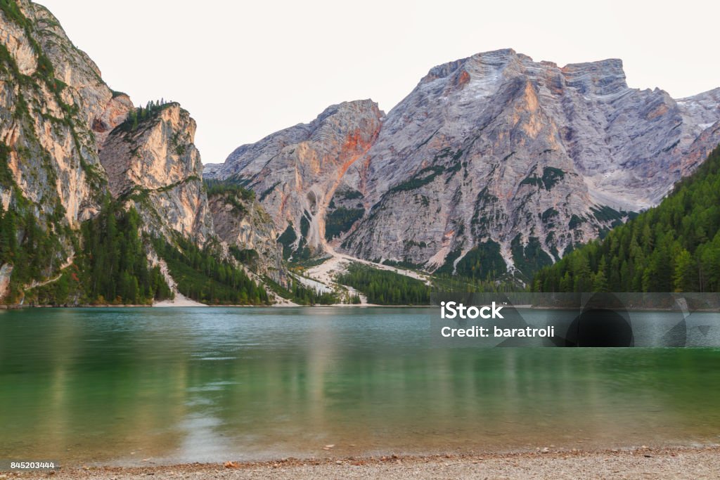 Beautiful Braies lake in the background of Seekofel mountain Beautiful Braies lake in the background of Seekofel mountain in Dolomites,Italy ( Pragser Wildsee ) Adventure Stock Photo