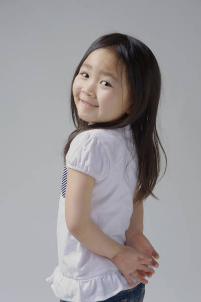 istock Behind him in back smiling 6-year-old girl 845208752