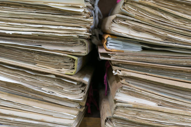 istock Old files in envelope paper stacking up in a messy order. 845221462