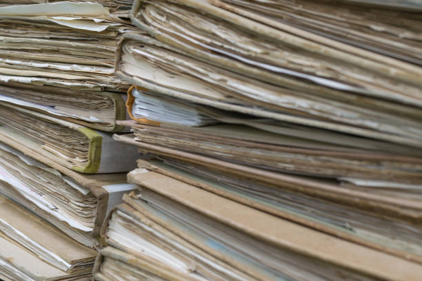 istock Old files in envelope paper stacking up in a messy order. 845221474