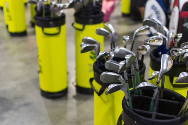 Many types of golf club in golf shop. stock photo