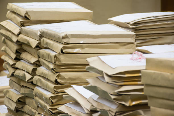 istock Old files in envelope paper stacking up in a messy order. 845224110