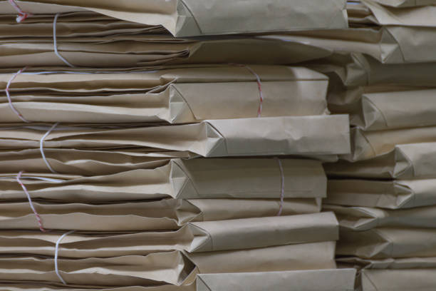 istock Old files in envelope paper stacking up in a messy order. 845224122