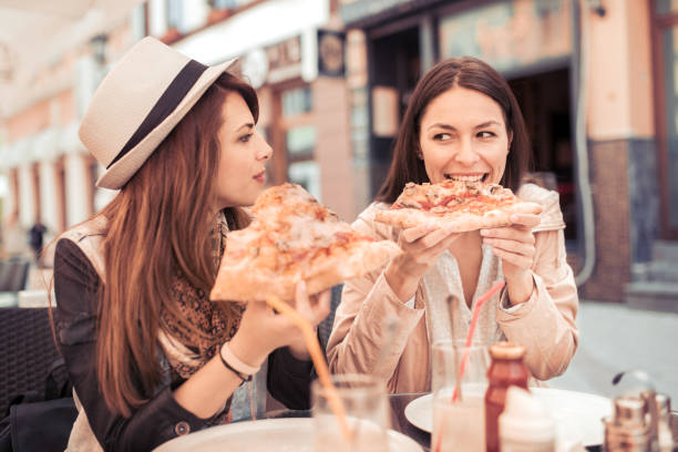 istock Two woman relaxing in the city 845231372