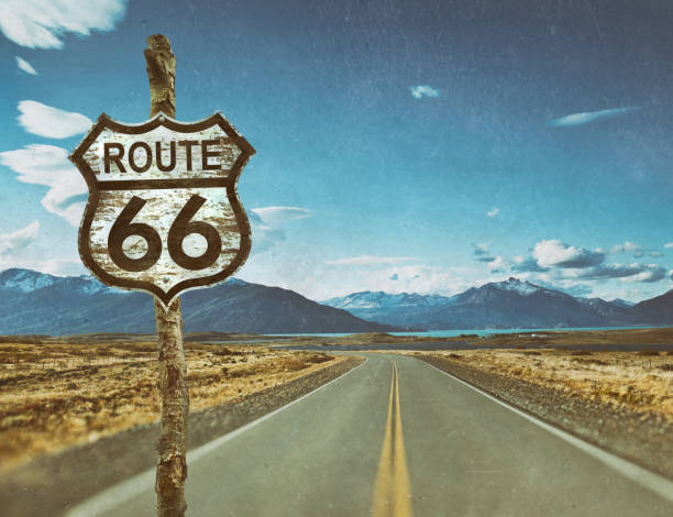 Highway sign for Route 66 on country road stock photo