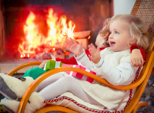 istock Two Kids Holding Christmas Presents 845235840