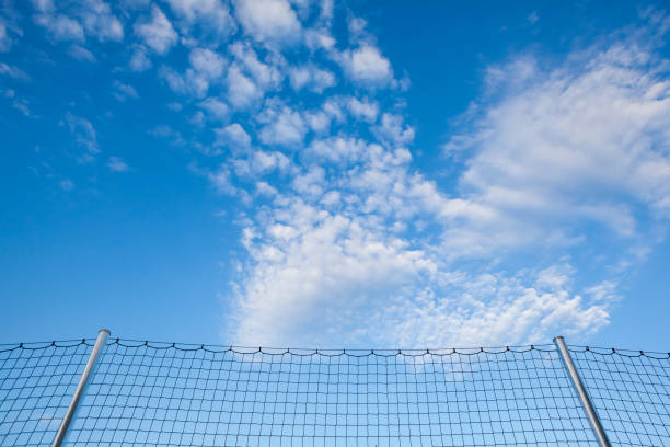 In the park there is a high safety net for football