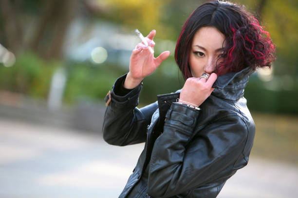 Woman holding a cigarette