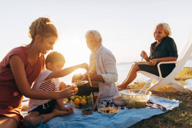 istock Seaside picnic with family 845259632