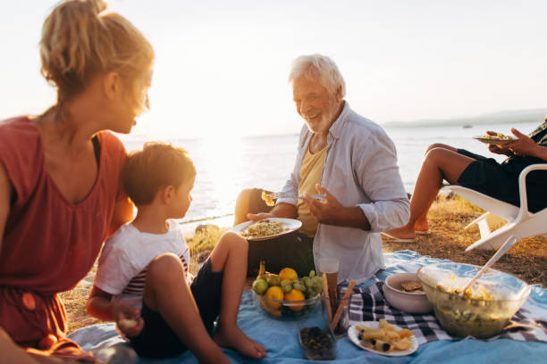 istock Seaside picnic with family 845259786