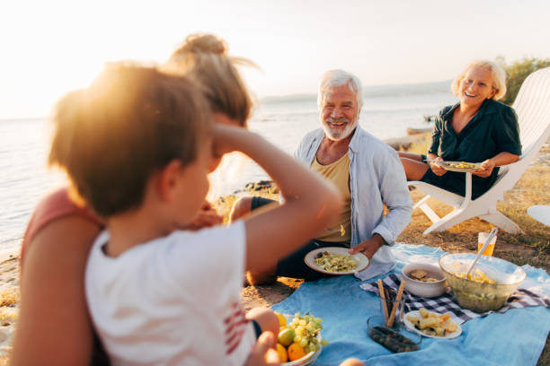 istock Seaside picnic with family 845259904