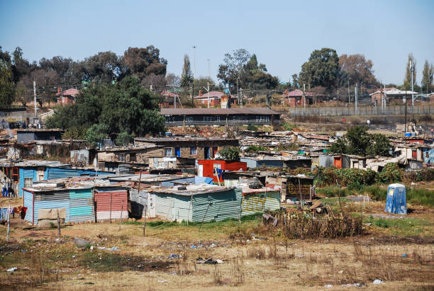 Slum in SOWETO, a township of Johannesburg, South Africa Slum in SOWETO, a township of Johannesburg, South Africa soweto stock pictures, royalty-free photos & images