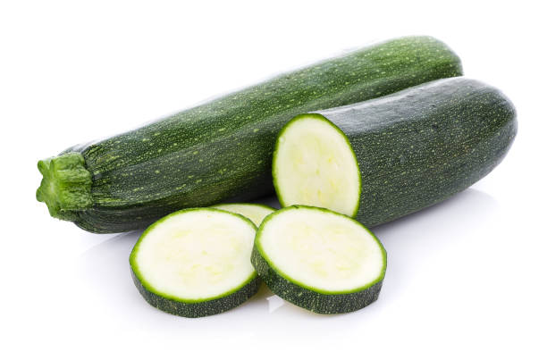 istock green zucchini vegetables isolated on white background 845260480
