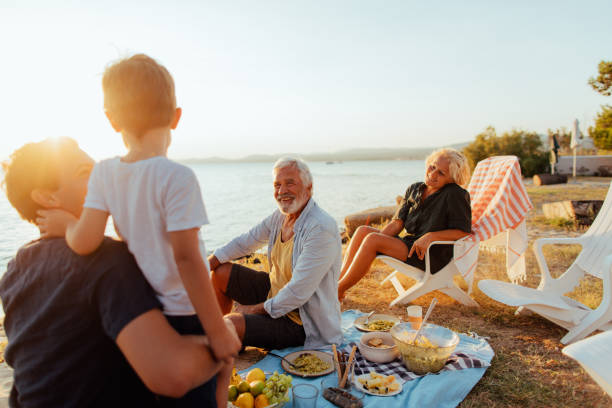 istock Seaside picnic with family 845260764