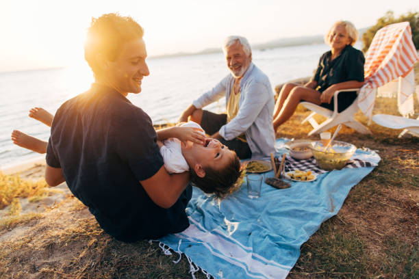istock Seaside picnic with family 845261112