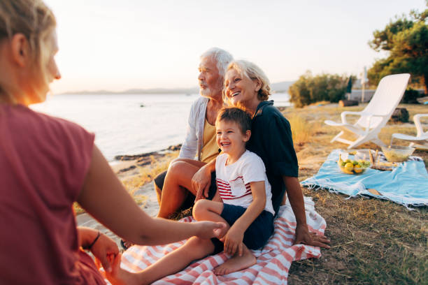 istock Family enjoying sunset 845261198