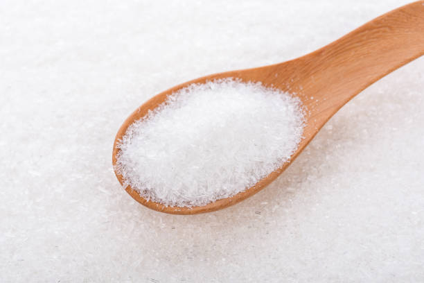 istock MonosodiumGlutamate (MSG or E621) on wooden spoon 845267306