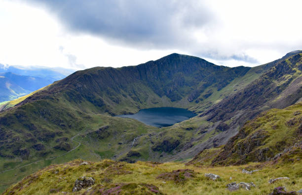 Cadair Idris A welsh mountain with a lake half way up called cadair Idris wales mountain mountain range hill stock pictures, royalty-free photos & images