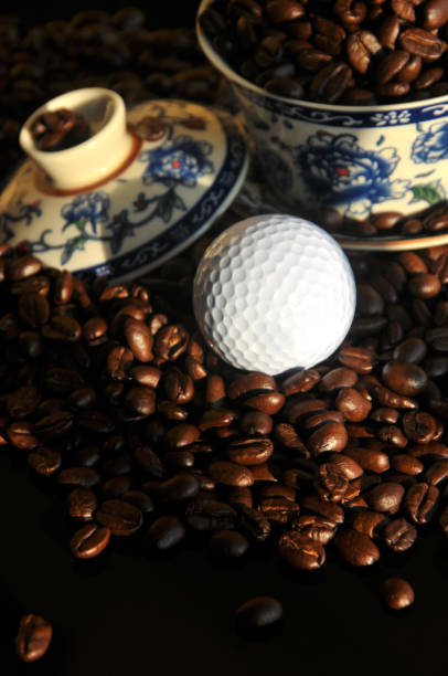 istock Chinese tea set and  coffee beans in sunset 845280470