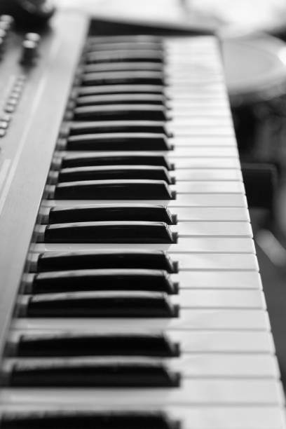 istock Keyboard of music electronic synthesizer, piano on blurred backg 845280854