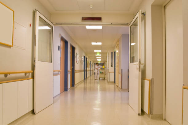 istock Hospital corridor with a nurse preparing medication 845287126