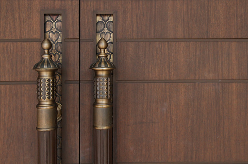 brass handle vintage style on  wood door brown colour