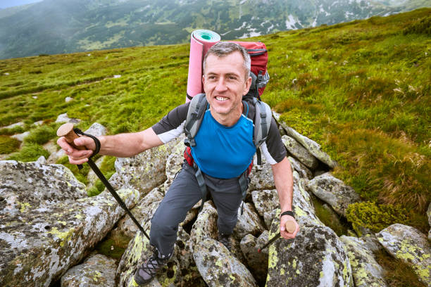 istock Hiking in the mountains in the summer with a backpack. 845298898