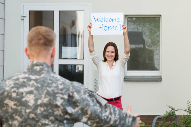 istock Wife Welcoming Her Husband Home 845298952