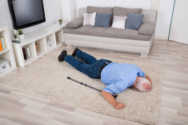 Unconscious Disabled Man Lying On Carpet