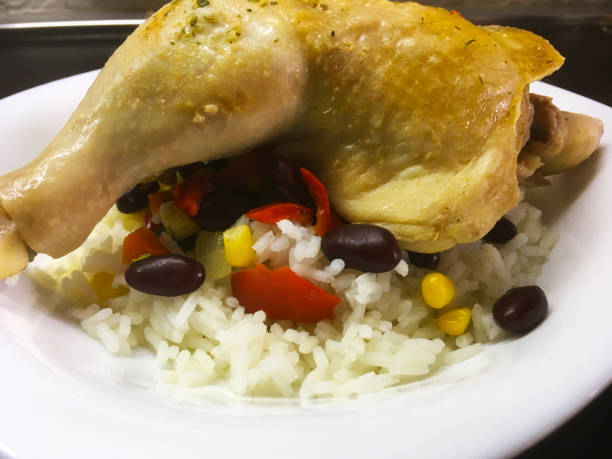 istock Chicken and rice on the plate, close up 845332562