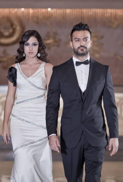 istock Couples walking in Evening Wear 845348402