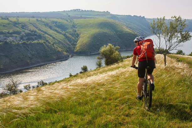 istock Adventure mountain biking on riverside 845350860