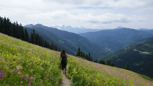 istock Young woman on a hiking trail 845354124