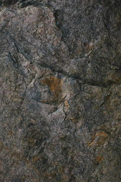 istock Rock texture and background. Rough abstract stone texture. Stone background. Abstract texture and background for designers. Abstract rock texture. Closeup view of natural rock. Rough stone macro. 845357648