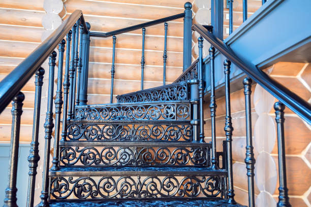 istock Black forged iron staircase close up 845358958