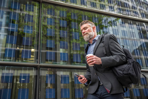istock Businessman walking on the street 845367366