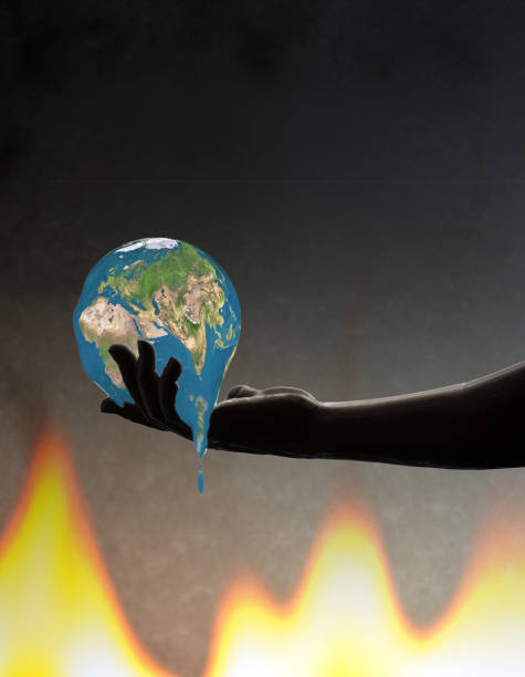 istock Fire and hand holding the melting earth 845372684