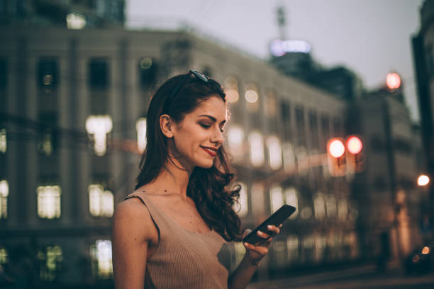 istock Young woman standing outdoors 845378872