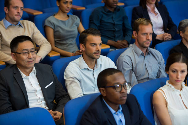 istock Business executives listening to speech 845387130