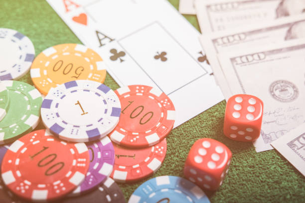 istock Gambling chips and cards on a green 845393050