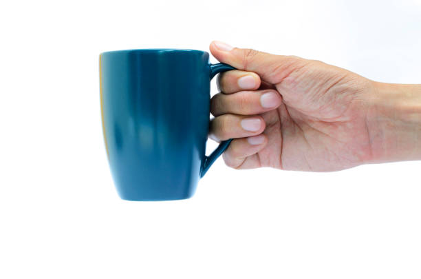 istock Right hand holding blue coffee cup on white backgrounds 845393116