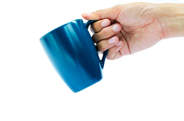 istock Take out action with hand holding blue coffee cup on white backgrounds 845393130