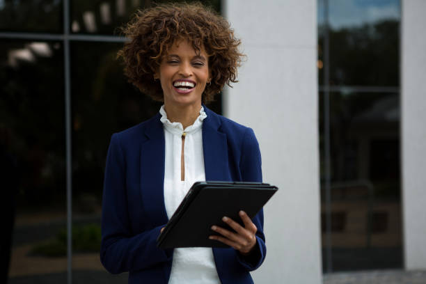 istock Smiling businesswoman using digital tablet 845397032