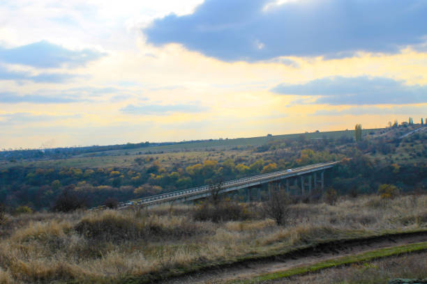 istock Bridge across the river Southern Bug in Ukraine on autumn 845399946