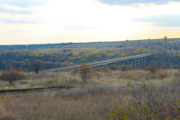 istock Bridge across the river Southern Bug in Ukraine on autumn 845399950