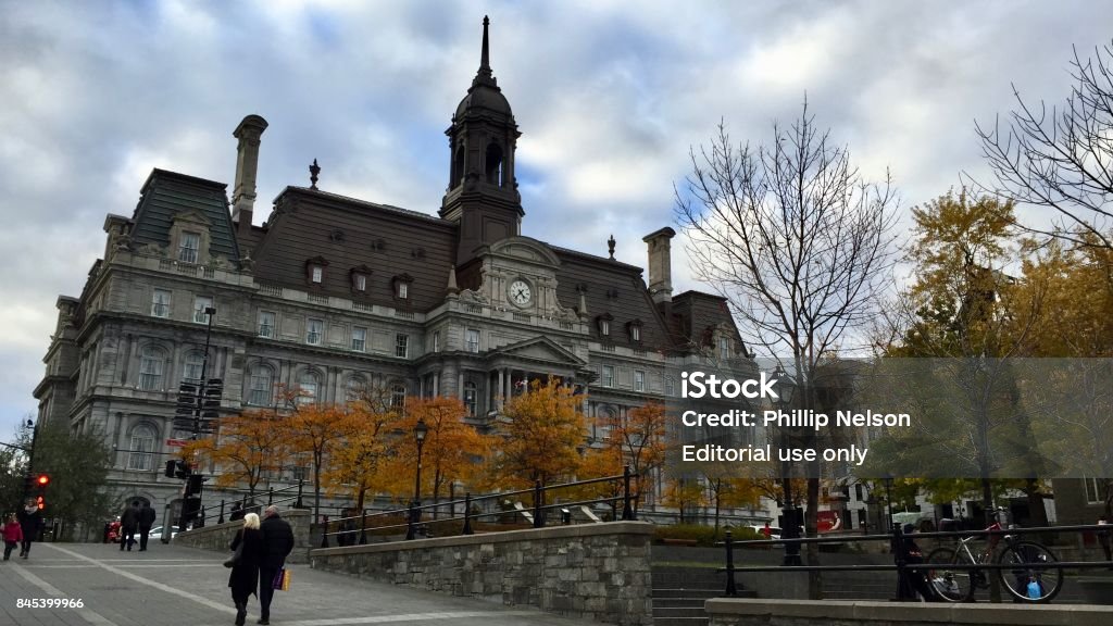 View of City Hall in Vieux-Montreal, Canada View of City Hall and surrounding environs in Vieux-Montreal, Canada, also known as Hotel de Ville, on a cloudy October day in 2015. Architecture Stock Photo