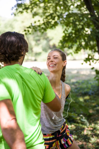 istock Young couple having exercise in the park 845400136