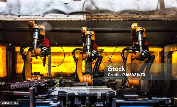 Robots Welding Team Stock Photo - Download Image Now - Arm, Arts Culture and Entertainment, Auto Repair Shop