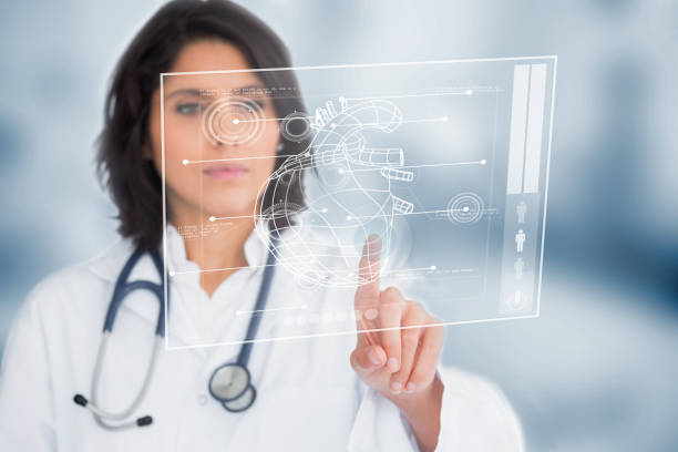 istock Calm doctor touching a medical interface 845402846